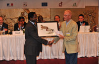 Mr. Guy-Noël Olivier receiving the AEWA Waterbird Conservation Award 2008 on behalf of OMPO 
