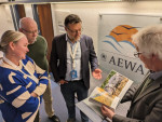 Peter Prokosch receiving a copy of the AEWA 20th Anniversary Coffee Table Book. (Photo: Florian Keil / UNEP/AEWA Secretariat)